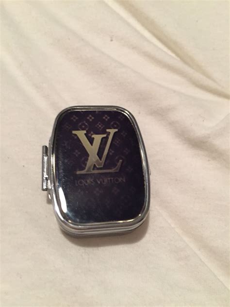 gold louis vuitton pill